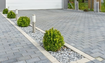 Aménagements extérieurs dans le Brabant wallon : comment aménager son allée de garage ?